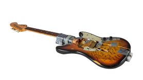 kurt cobain smashed guitar auction